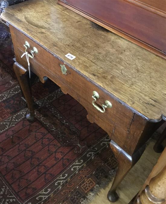 18C oak lowboy with shaped apron